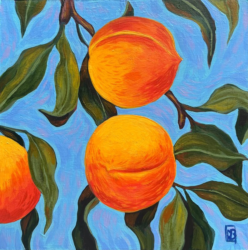 Oranges on the branch against a blue sky